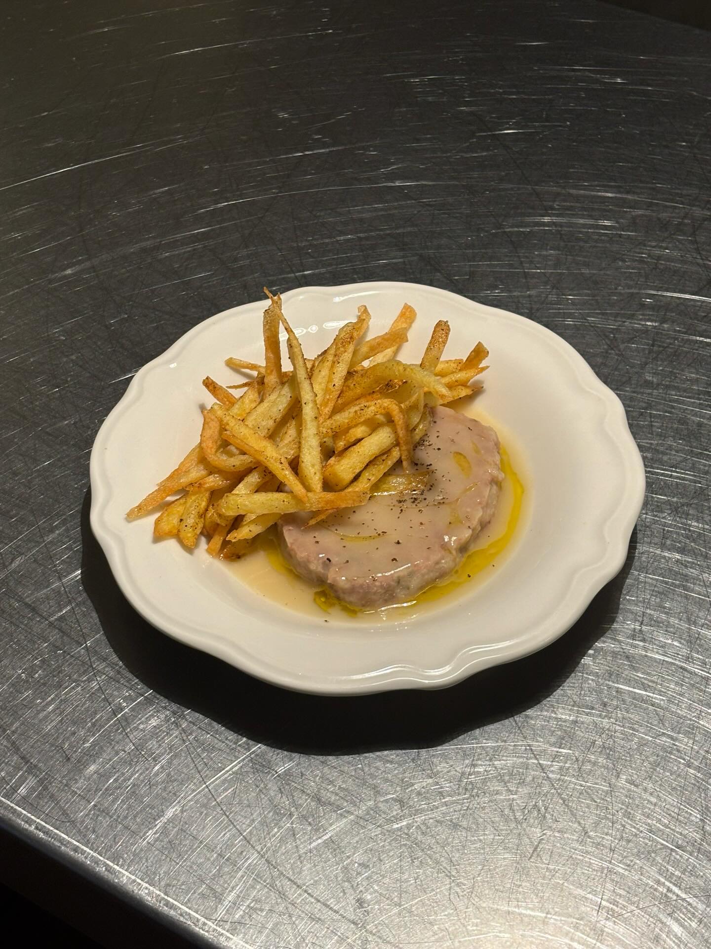 La pilota d’escudella amb patates fregides d'Arraval