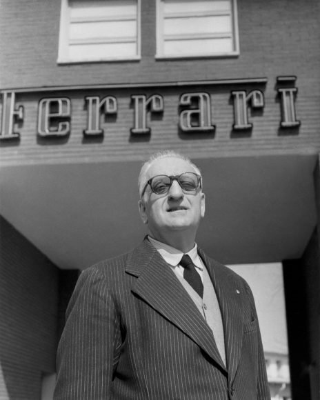 (9)7. Enzo Ferrari at the entrance of the Ferrari Factory, 1957