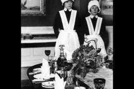 Parlourmaid and Under Parlourmaid ready to serve dinner 1939