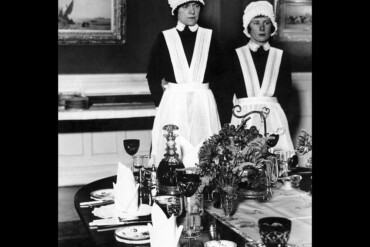 Parlourmaid and Under Parlourmaid ready to serve dinner 1939