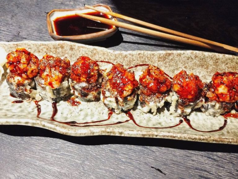 Beach round, tempura roll topped with salmon tartar.