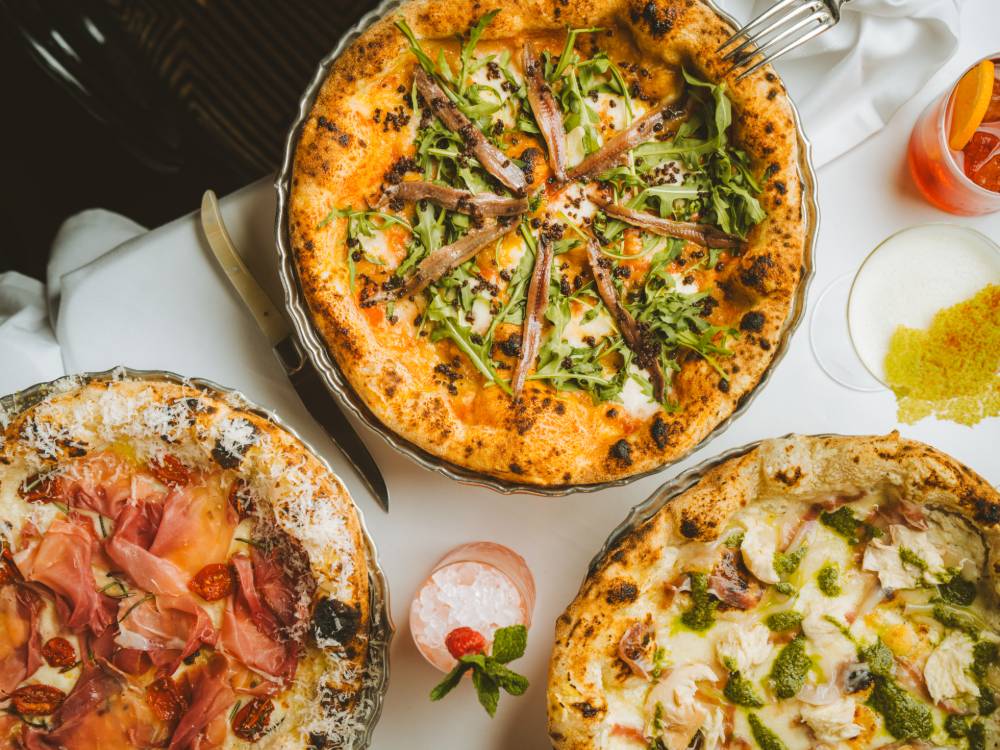 Algunas de sus pizzas gourmet.